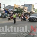 Personil Satlantas Polres Gowa turun Langsung  Mengatur Lalulintas Di Jalan Poros Gowa Takalar