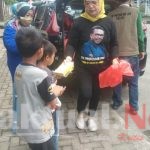 Bantu Ringankan Beban Warga Di Tengah Pandemi, TPOJ Gowa Bagikan Masker Dan Makanan