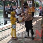 Himbau Prokes & Bagikan 2.200 Masker Medis Gratis, Polres Kep Seribu Cegah Penyebaran Covid-19