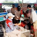 Polres Kep Seribu Himbau Prokes Dan Bagikan 1.900 Masker Medis Gratis Dalam Cegah Covid-19