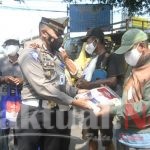 Kasatlantas Polres Serang dan Anggotanya Bagikan Paket Sembako Dimasa PPKM Darurat