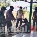 Cegah Covid-19, 1.500 Masker di Bagikan Polres Kep Seribu ke Warga