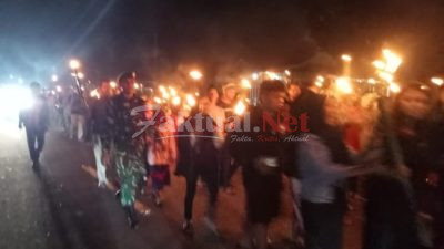 Babinsa Bambalamotu Laksanakan Pengaman Pawai Obor Menyambut Hari Raya