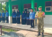 Babinsa Koramil Bambalamotu Jadi Pembina Upacara Hari Sumpah Pemuda ke-98 di SMPN 02 Sarjo