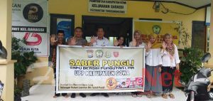 Stop Pungutan liar, Bhabinkamtibmas Garassi Polres Gowa bersama Kelurahan Garassi Bentangkan Spanduk