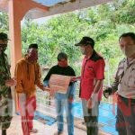 Pastikan Tepat Sasaran Bhabinkamtibmas Bersama Babinsa Kawal Pendistribusian BLT
