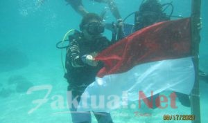 FKPPI – Komunitas Penyelam Kota Kendari Sukses Kibarkan Bendera Merah Putih Bawah Laut di Pulau Kartika