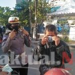 Menuju WBBM, Sat Lantas Polres Gowa Beri Edukasi dan Bagikan Masker