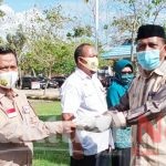 Pemda Wakatobi Bersama Forkopimda Menyerahkan 18.000 Masker Kepada Penyelenggara Pemilu